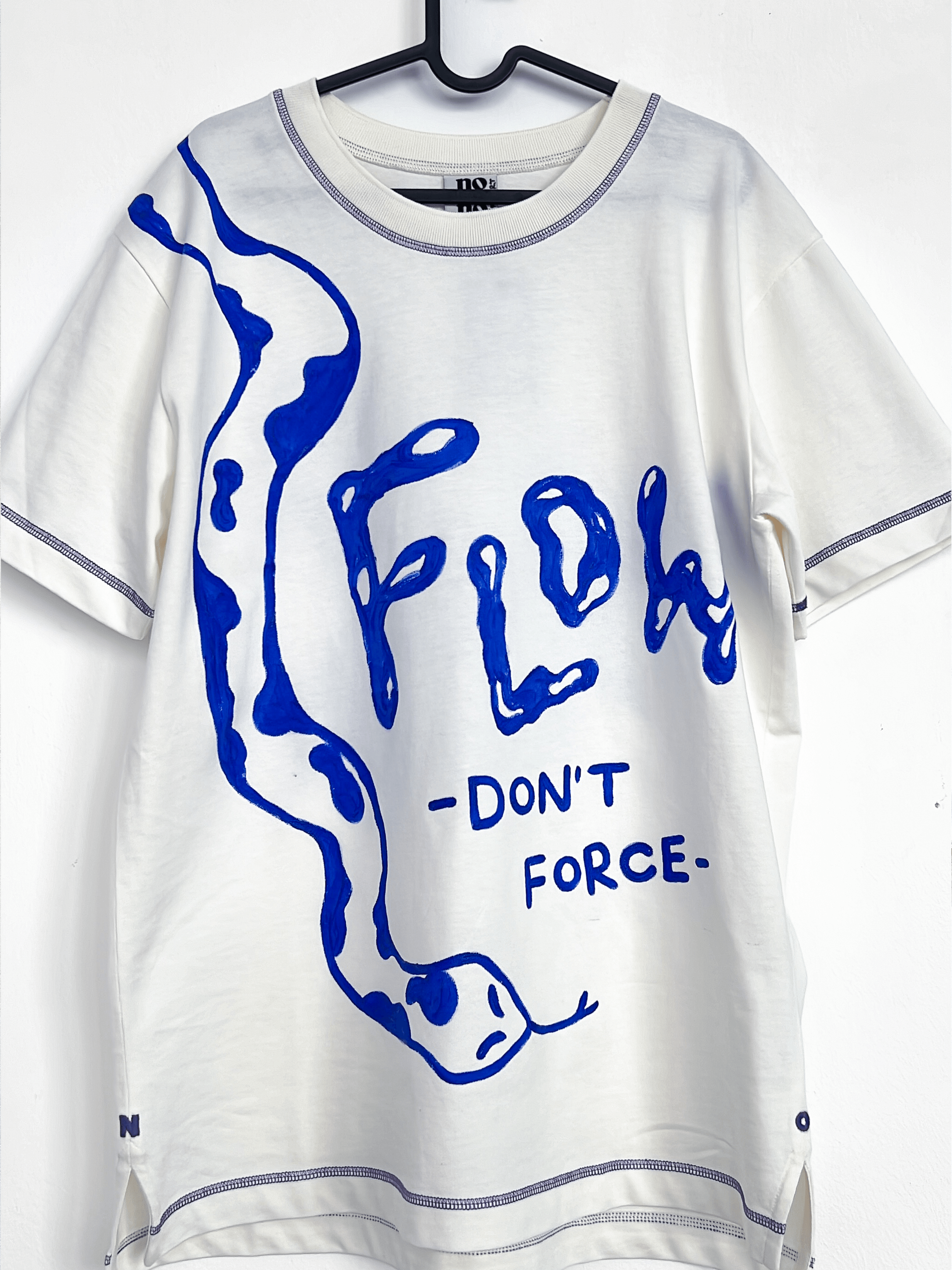 Flow, don't force hand-painted lettering on a t-shirt